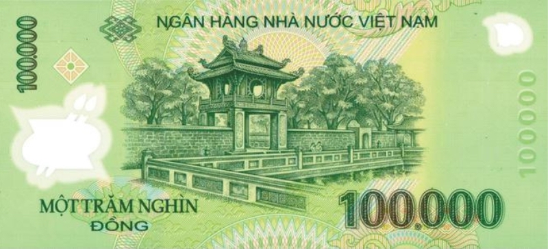 Le verso du billet de 100 000 dôngs vietnamiens représente une illustration du Pavillon Khuê Van Cac